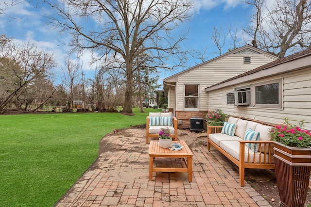 view of patio / terrace featuring central AC unit and outdoor lounge area