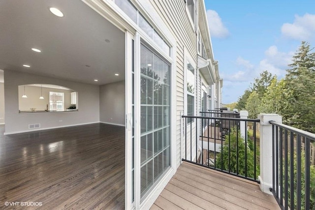 balcony featuring visible vents