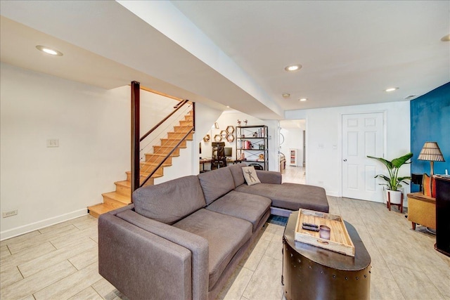 living room featuring recessed lighting, stairway, light wood-style flooring, and baseboards