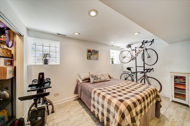 bedroom with recessed lighting, light tile patterned flooring, visible vents, and baseboards