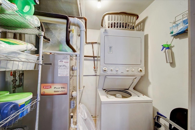 washroom with stacked washing maching and dryer and laundry area