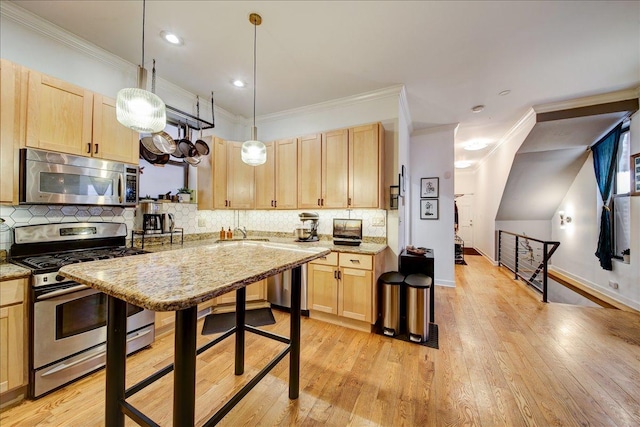 kitchen with light brown cabinets, appliances with stainless steel finishes, backsplash, a sink, and crown molding