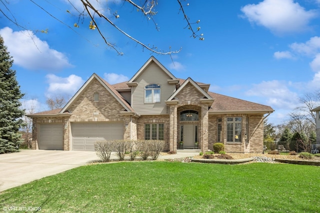 traditional-style house with driveway, a shingled roof, a front yard, a garage, and brick siding