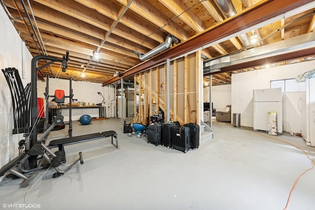 unfinished below grade area with freestanding refrigerator