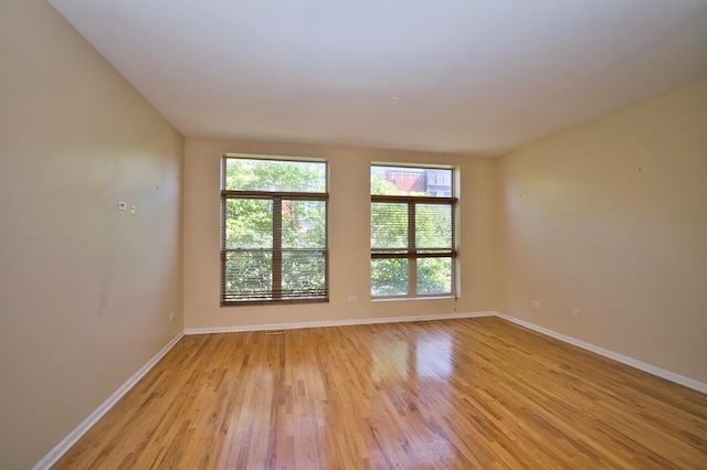 353 E Eastgate Pl, Chicago, IL 60616 - empty room featuring light wood-style floors and baseboards
