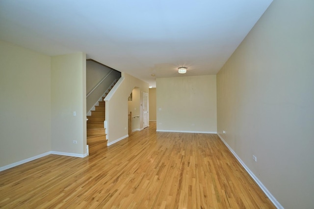 353 E Eastgate Pl, Chicago, IL 60616 - empty room featuring light wood-style floors and stairs