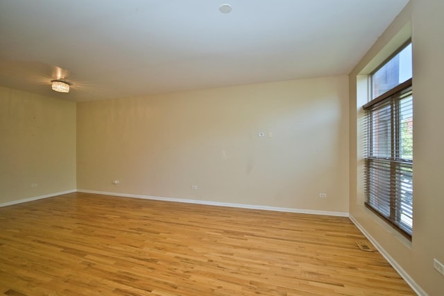 353 E Eastgate Pl, Chicago, IL 60616 - empty room featuring light wood finished floors and baseboards