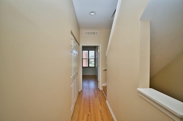 353 E Eastgate Pl, Chicago, IL 60616 - hallway featuring light wood-style floors and baseboards