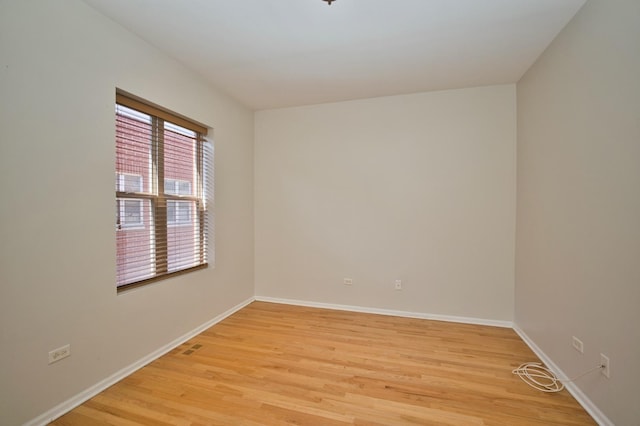 353 E Eastgate Pl, Chicago, IL 60616 - empty room featuring light wood-style flooring and baseboards