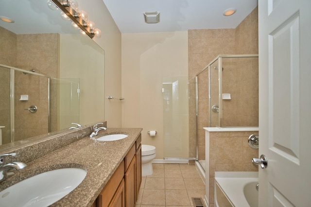 353 E Eastgate Pl, Chicago, IL 60616 - full bath featuring tile patterned flooring, a stall shower, double vanity, and a garden tub