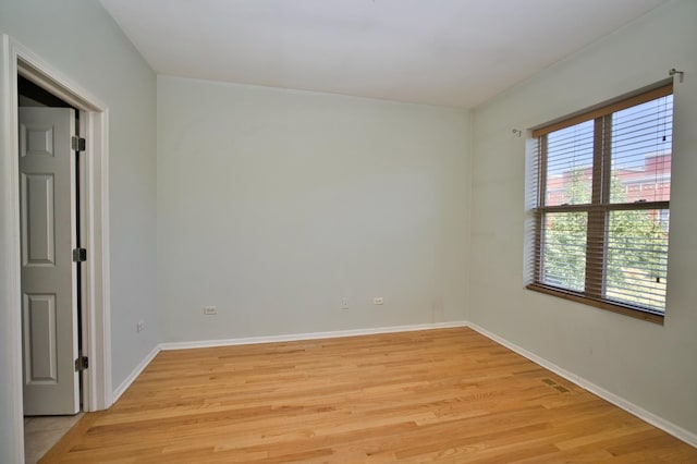 353 E Eastgate Pl, Chicago, IL 60616 - spare room with light wood-style floors and baseboards