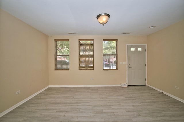 353 E Eastgate Pl, Chicago, IL 60616 - empty room featuring plenty of natural light and light wood-style floors