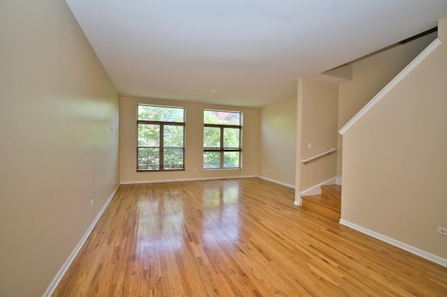 353 E Eastgate Pl, Chicago, IL 60616 - spare room with light wood finished floors and stairs