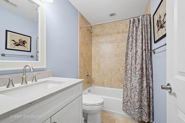 bathroom with vanity, tile patterned flooring, visible vents, toilet, and shower / bath combo