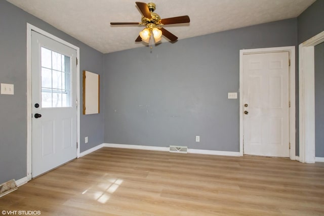 1105 Eileen St, Coal City, IL 60416 - entryway featuring ceiling fan, light wood-type flooring, and baseboards