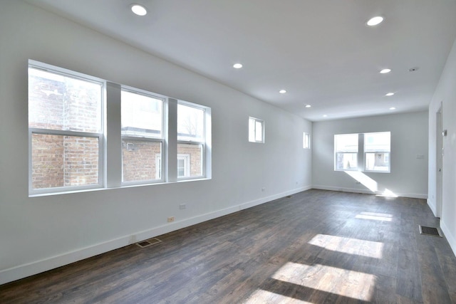 1405 S Central Ave, Cicero, IL 60804 - empty room featuring baseboards, visible vents, and dark wood finished floors
