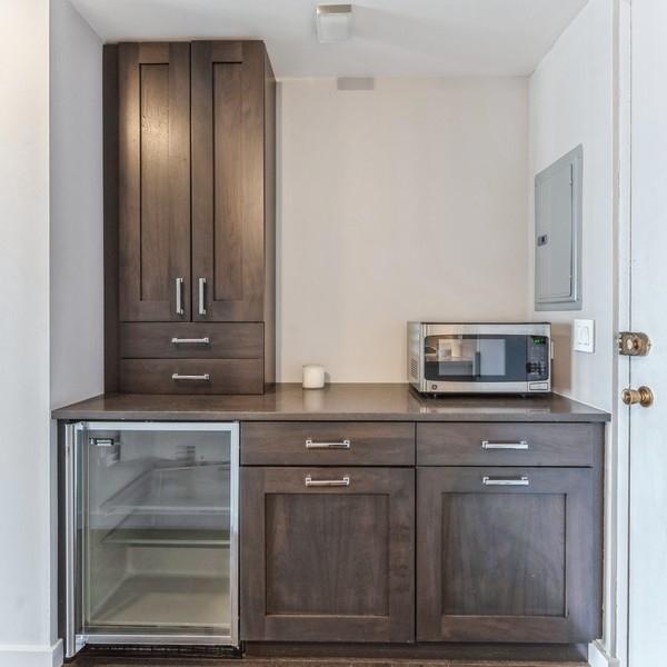 1636 N Wells St Unit 609, Chicago, IL 60614 - bar area with appliances with stainless steel finishes, electric panel, and wine cooler
