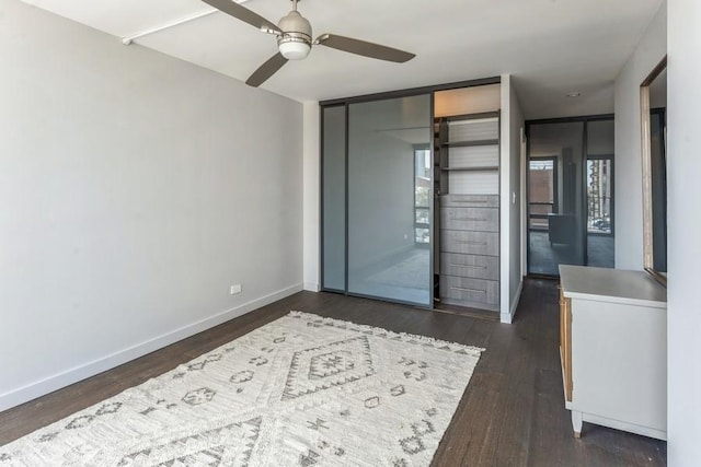 1636 N Wells St Unit 609, Chicago, IL 60614 - unfurnished bedroom with dark wood-type flooring, a ceiling fan, and a closet