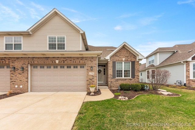 2793 Nicole Cir, Aurora, IL 60502 - view of front of property featuring a garage, driveway, a front lawn, and brick siding