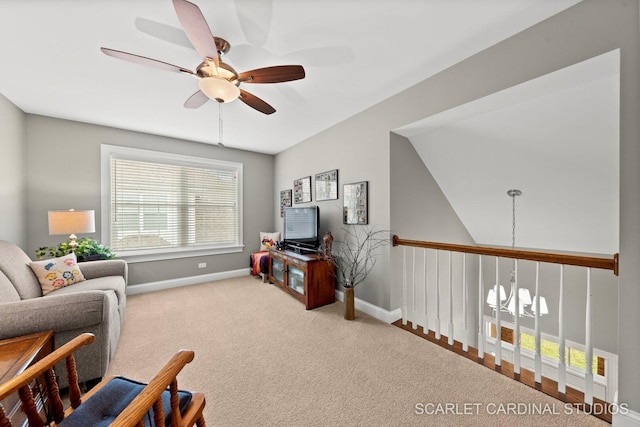 2793 Nicole Cir, Aurora, IL 60502 - living area featuring carpet floors, a ceiling fan, and baseboards