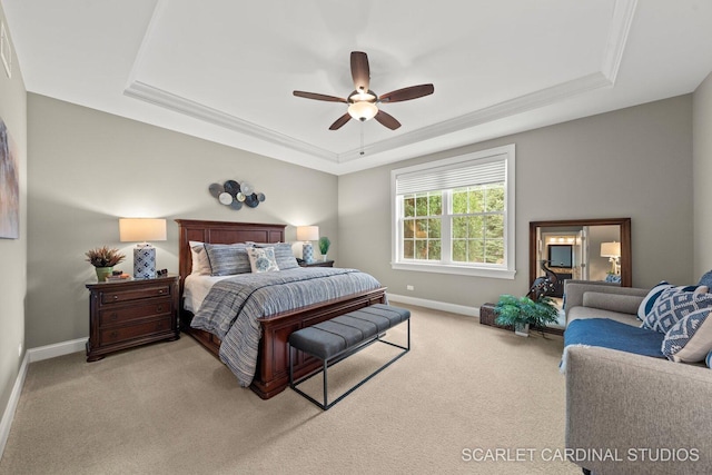2793 Nicole Cir, Aurora, IL 60502 - bedroom featuring crown molding, baseboards, light carpet, and a tray ceiling