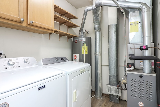 301 Memory Ln Unit 3C, Westmont, IL 60559 - laundry room featuring washer and clothes dryer, dark wood-style flooring, cabinet space, heating unit, and water heater