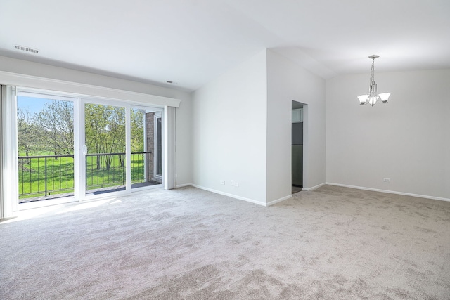 301 Memory Ln Unit 3C, Westmont, IL 60559 - unfurnished room featuring a chandelier, carpet flooring, baseboards, and vaulted ceiling