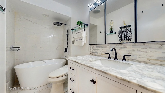 bathroom with vanity, walk in shower, a soaking tub, backsplash, and toilet