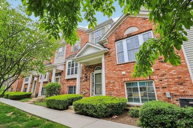 2303 Neubauer Cir, Lindenhurst, IL 60046 - view of front facade featuring brick siding