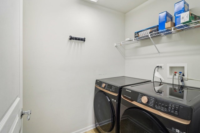 2303 Neubauer Cir, Lindenhurst, IL 60046 - laundry room with washer and clothes dryer and baseboards