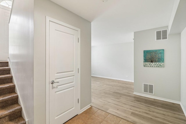 2303 Neubauer Cir, Lindenhurst, IL 60046 - stairs with baseboards and wood finished floors