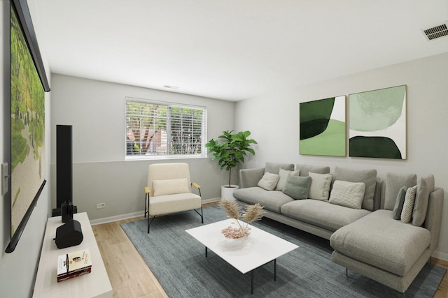 2303 Neubauer Cir, Lindenhurst, IL 60046 - living area featuring wood finished floors and baseboards
