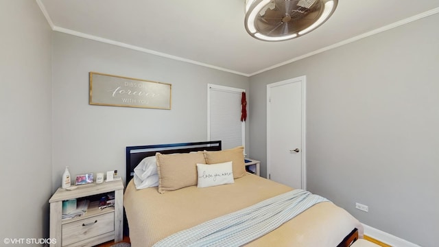 bedroom with baseboards and ornamental molding