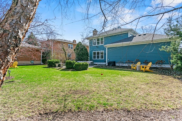 522 Superior St, Vernon Hills, IL 60061 - rear view of property with a lawn and a chimney