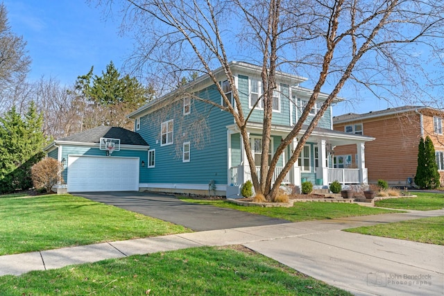 522 Superior St, Vernon Hills, IL 60061 - view of front of home with a porch, a garage, aphalt driveway, an outdoor structure, and a front lawn