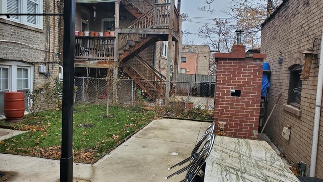 6147 N Mozart St Unit 3, Chicago, IL 60659 - view of patio with stairway