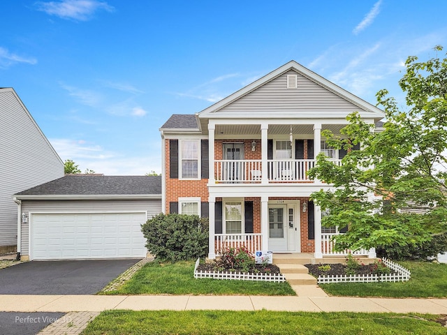 1704 Walnut Park Ln, Aurora, IL 60504 - neoclassical home featuring a porch, driveway, brick siding, a balcony, and a garage