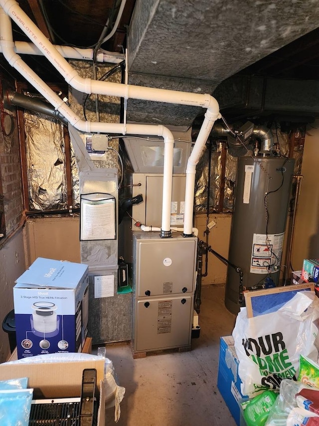 utility room featuring gas water heater