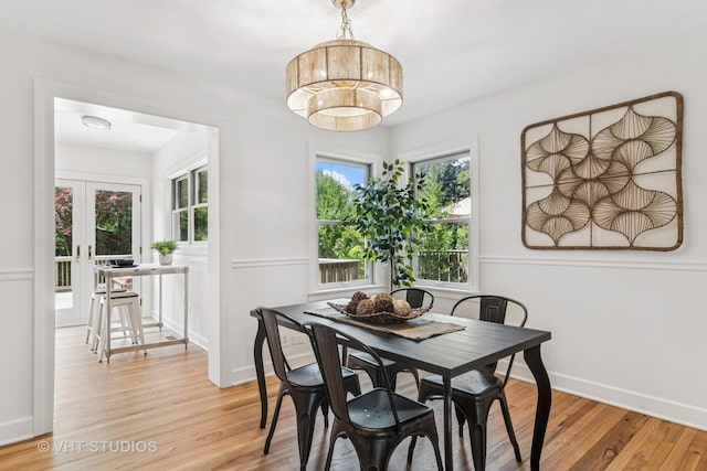 212 N Russel St, Mount Prospect, IL 60056 - dining area with light wood-type flooring and french doors