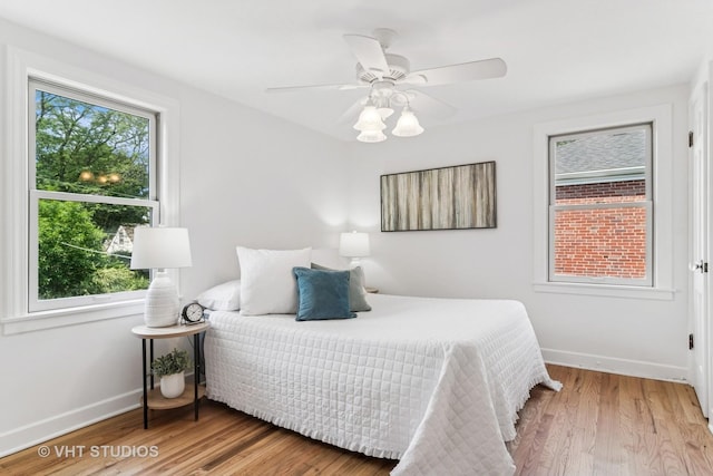 212 N Russel St, Mount Prospect, IL 60056 - bedroom featuring wood finished floors and ceiling fan