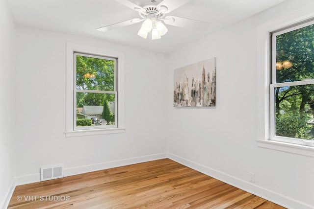 212 N Russel St, Mount Prospect, IL 60056 - spare room featuring light wood-style floors and a ceiling fan