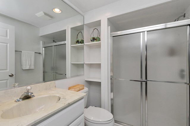 full bath with visible vents, toilet, recessed lighting, vanity, and a stall shower
