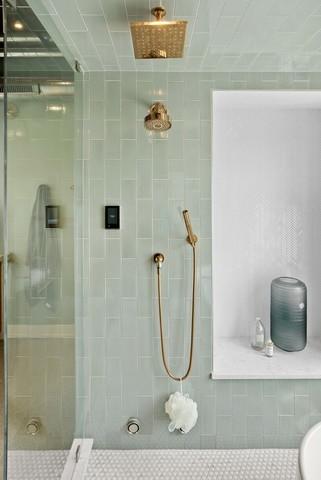 full bathroom featuring a shower stall
