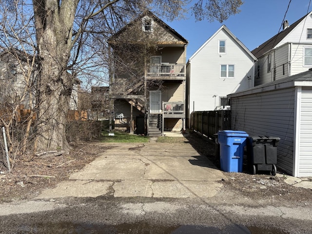back of property with stairway