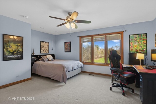 bedroom featuring ceiling fan, baseboards, and carpet flooring