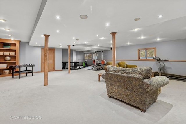 living area featuring light carpet and recessed lighting