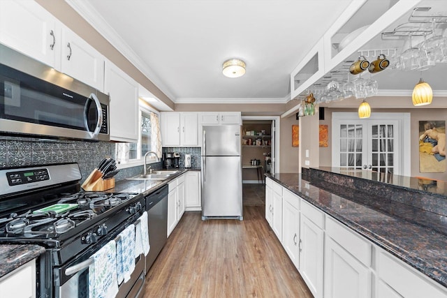 472 Lakewood Blvd, Park Forest, IL 60466 - kitchen featuring a sink, light wood-type flooring, french doors, stainless steel appliances, and white cabinets