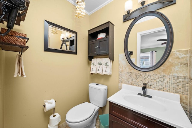 472 Lakewood Blvd, Park Forest, IL 60466 - bathroom featuring backsplash, toilet, ornamental molding, and vanity