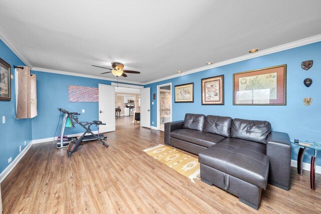 472 Lakewood Blvd, Park Forest, IL 60466 - living area featuring baseboards, wood finished floors, ceiling fan, and crown molding