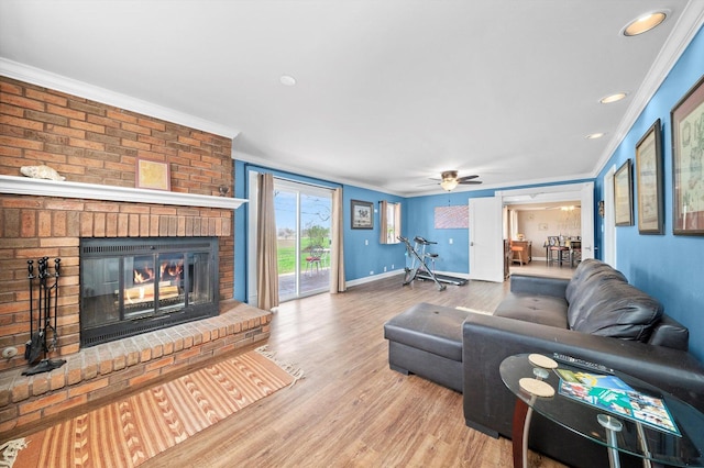 472 Lakewood Blvd, Park Forest, IL 60466 - living area with wood finished floors, a fireplace, ceiling fan, and crown molding